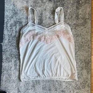 Small white tank top with floral design